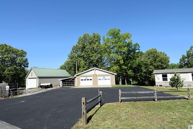 Welcome to this Kentucky Lake Home where quality meets space - photo 17