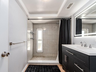 Newly renovated 3 bedroom 3 bathroom home sitting on a oversized - photo 21