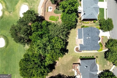 Perfectly positioned on a PREMIUM GOLF COURSE LOT, this - photo 2