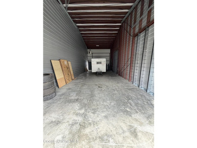 Versatile 20'x45' commercial condo featuring a 14'x14' insulated - photo 3