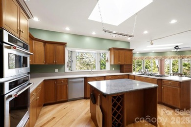 Step into this Kenmure home that feels like a private retreat - photo 9