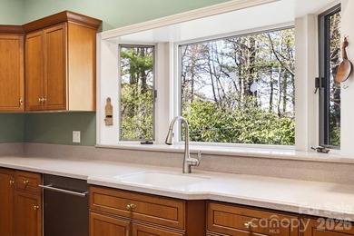 Step into this Kenmure home that feels like a private retreat - photo 10