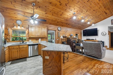 Nestled within the exclusive gated Lake Rhodhiss community of - photo 12