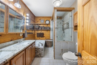 Nestled within the exclusive gated Lake Rhodhiss community of - photo 22