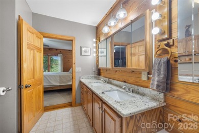 Nestled within the exclusive gated Lake Rhodhiss community of - photo 23