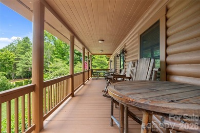 Nestled within the exclusive gated Lake Rhodhiss community of - photo 31