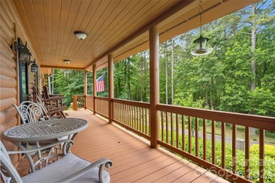 Nestled within the exclusive gated Lake Rhodhiss community of - photo 32