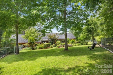 Nestled within the exclusive gated Lake Rhodhiss community of - photo 33