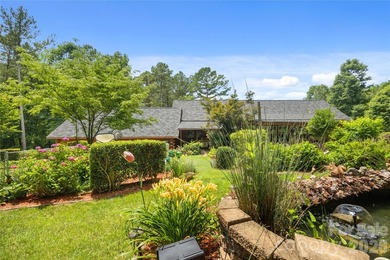 Nestled within the exclusive gated Lake Rhodhiss community of - photo 37