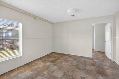 This home is located in Palm Haven Estates, an allage community - photo 8