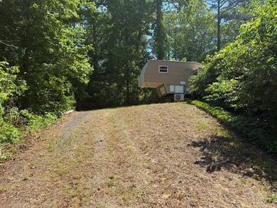 Perched on a scenic hill, this unique piece of land offers the - photo 4