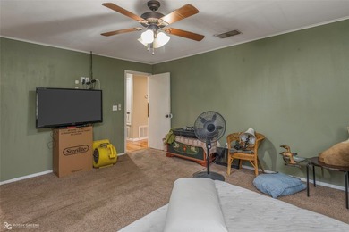 This spacious four-bedroom, two-bath home offers room to spread - photo 15