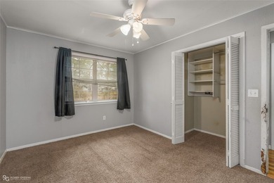 This spacious four-bedroom, two-bath home offers room to spread - photo 19