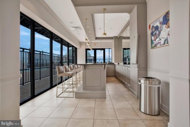 Experience elevated living in this stunning 10th-floor residence