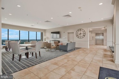 Experience elevated living in this stunning 10th-floor residence