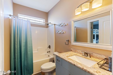 Just four blocks from the sand and surf and close to local