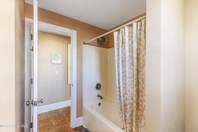 Just four blocks from the sand and surf and close to local