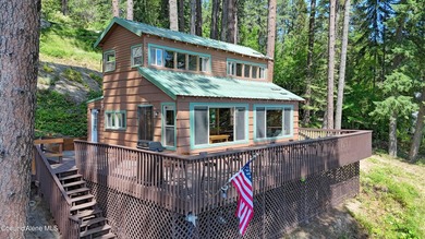 Over 200 feet of Hayden Lake frontage on the coveted close side - photo 4