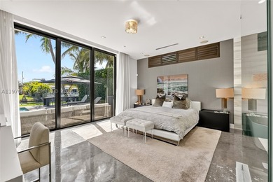 Located on the exclusive gated island of Biscayne Point, this - photo 11