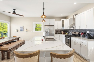 Completely reimagined and beautifully renovated, this Lake - photo 12