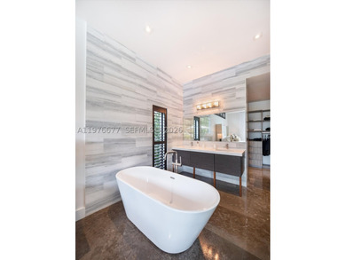 Located on the exclusive gated island of Biscayne Point, this - photo 13