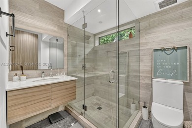 Located on the exclusive gated island of Biscayne Point, this - photo 18