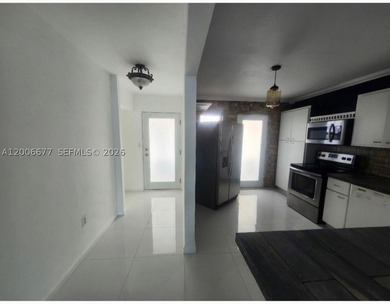 Enjoy direct waterfront living from this bright and spacious - photo 22