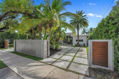 Located on the exclusive gated island of Biscayne Point, this - photo 25
