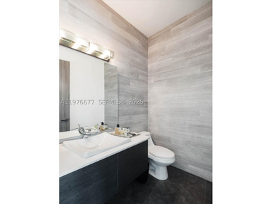 Located on the exclusive gated island of Biscayne Point, this - photo 26