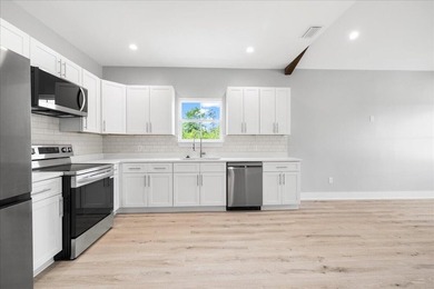 Welcome home to this beautiful new construction, never lived in - photo 11