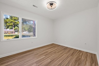 Three-bedroom, two-bathroom, single-story ranch home with a - photo 16