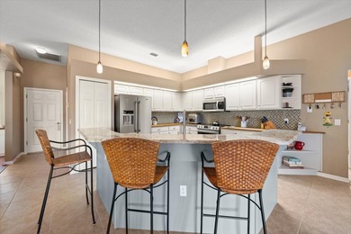 Experience the pinnacle of refined Florida living in this