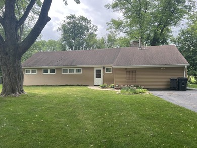 Opportunity awaits on this spacious 1-acre property! This home - photo 1