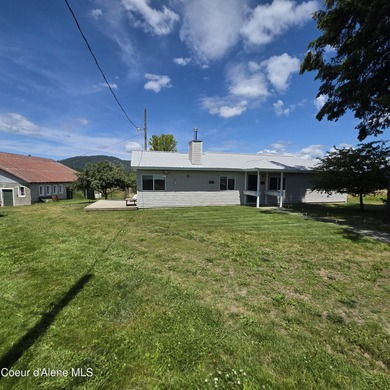 This rare find 3-bedroom home is centrally located and offers - photo 1