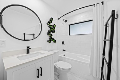 Beautifully updated 2BR/2BA corner home with a brand-new roof - photo 11