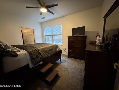 Move right into this bright 3rd-floor end-unit condo in the