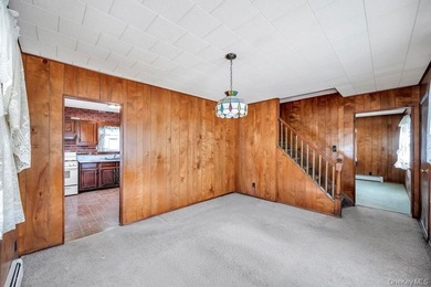 Introducing this charming and spacious Cape-style home featuring - photo 3