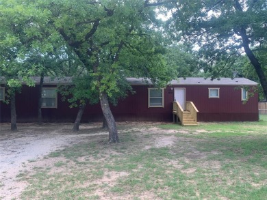 Lake Home For Sale in Pelican Bay, Texas