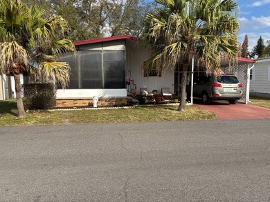 BEAUTIFULLY CARED FOR AND DECORATED 2/2 IN PET FRIENDLY GATED - photo 2