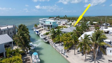 Stunning! Custom designed and built, elevated CBS home on a - photo 11
