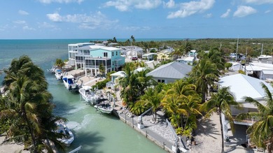 Stunning! Custom designed and built, elevated CBS home on a - photo 12