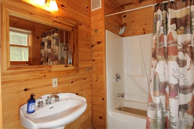 Exquisite Snows Channel cottage offers you refined island living - photo 17