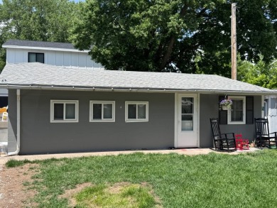 Welcome to easy lake living with this unique off-water - photo 2