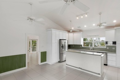 Stunning! Custom designed and built, elevated CBS home on a - photo 34