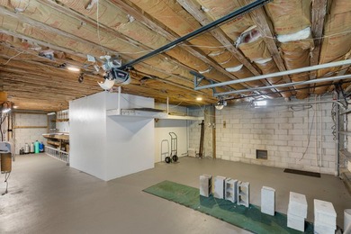 Stunning! Custom designed and built, elevated CBS home on a - photo 50
