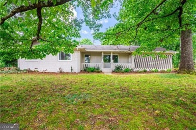 Lake Home For Sale in Oakwood, Georgia