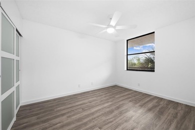 Ascend to the 4th floor of this 2-bed, 2-bath condo, nestled in