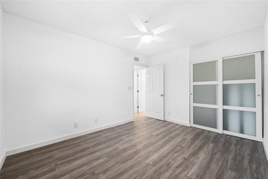 Ascend to the 4th floor of this 2-bed, 2-bath condo, nestled in