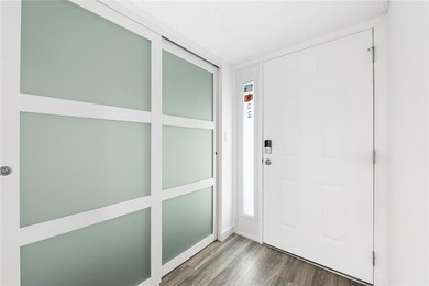 Ascend to the 4th floor of this 2-bed, 2-bath condo, nestled in