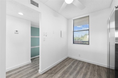 Ascend to the 4th floor of this 2-bed, 2-bath condo, nestled in